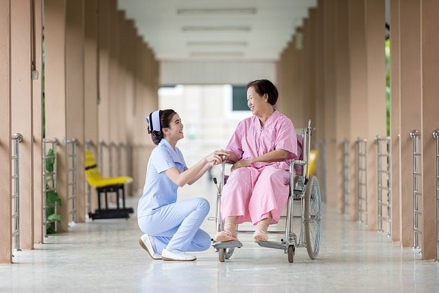 Asian Nurse with Patient